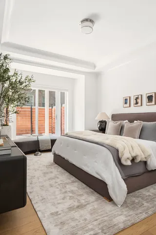 a kitchen with a sink cabinets and window
