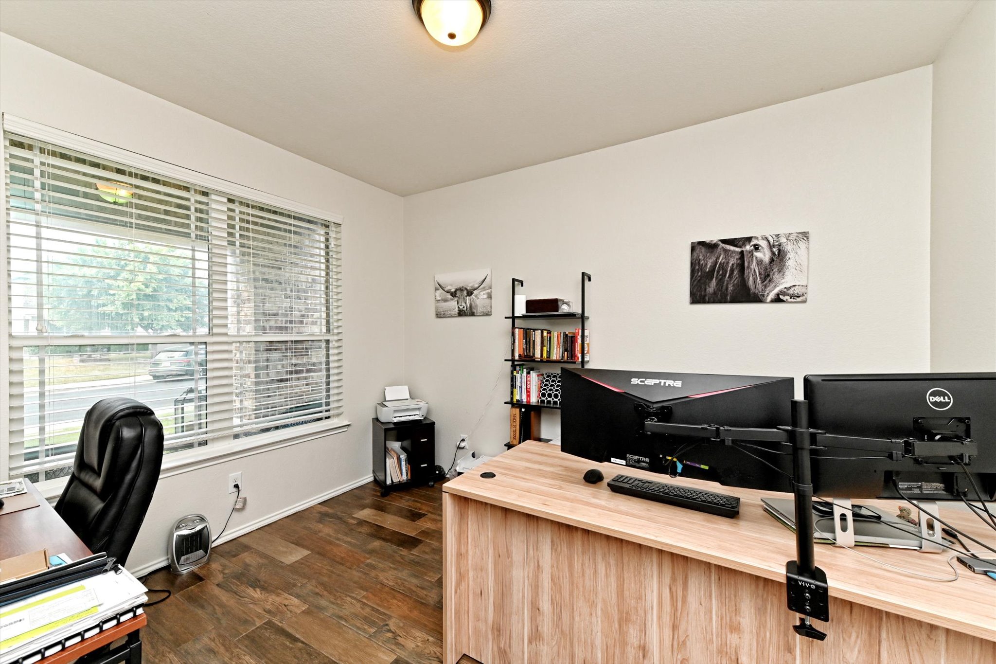 210 Animas Drive Georgetown, TX 78626 - Photo 14 of 31 a view of a workspace with furniture and a window
