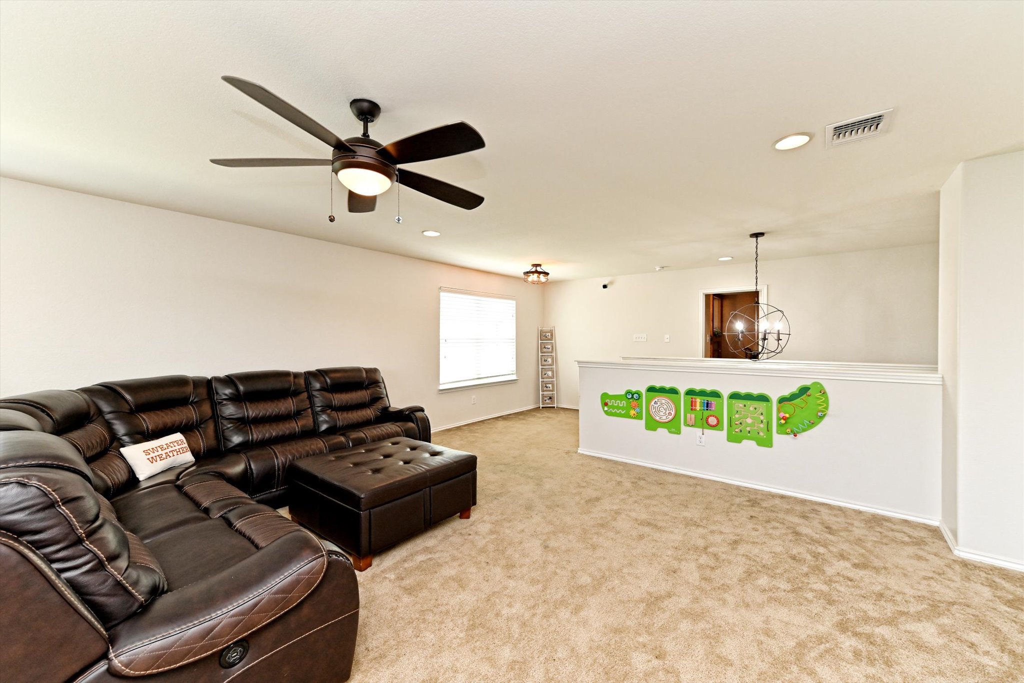 210 Animas Drive Georgetown, TX 78626 - Photo 22 of 31 a living room with furniture and a wooden floor