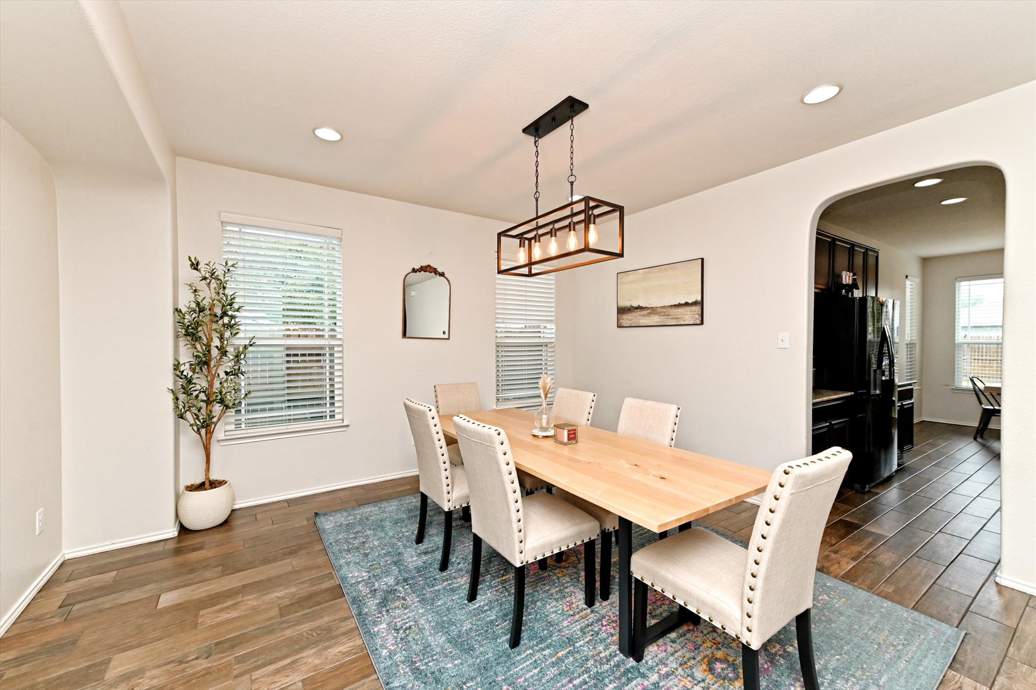 210 Animas Drive Georgetown, TX 78626 - Photo 5 of 31 a view of a dining room with furniture window and wooden floor