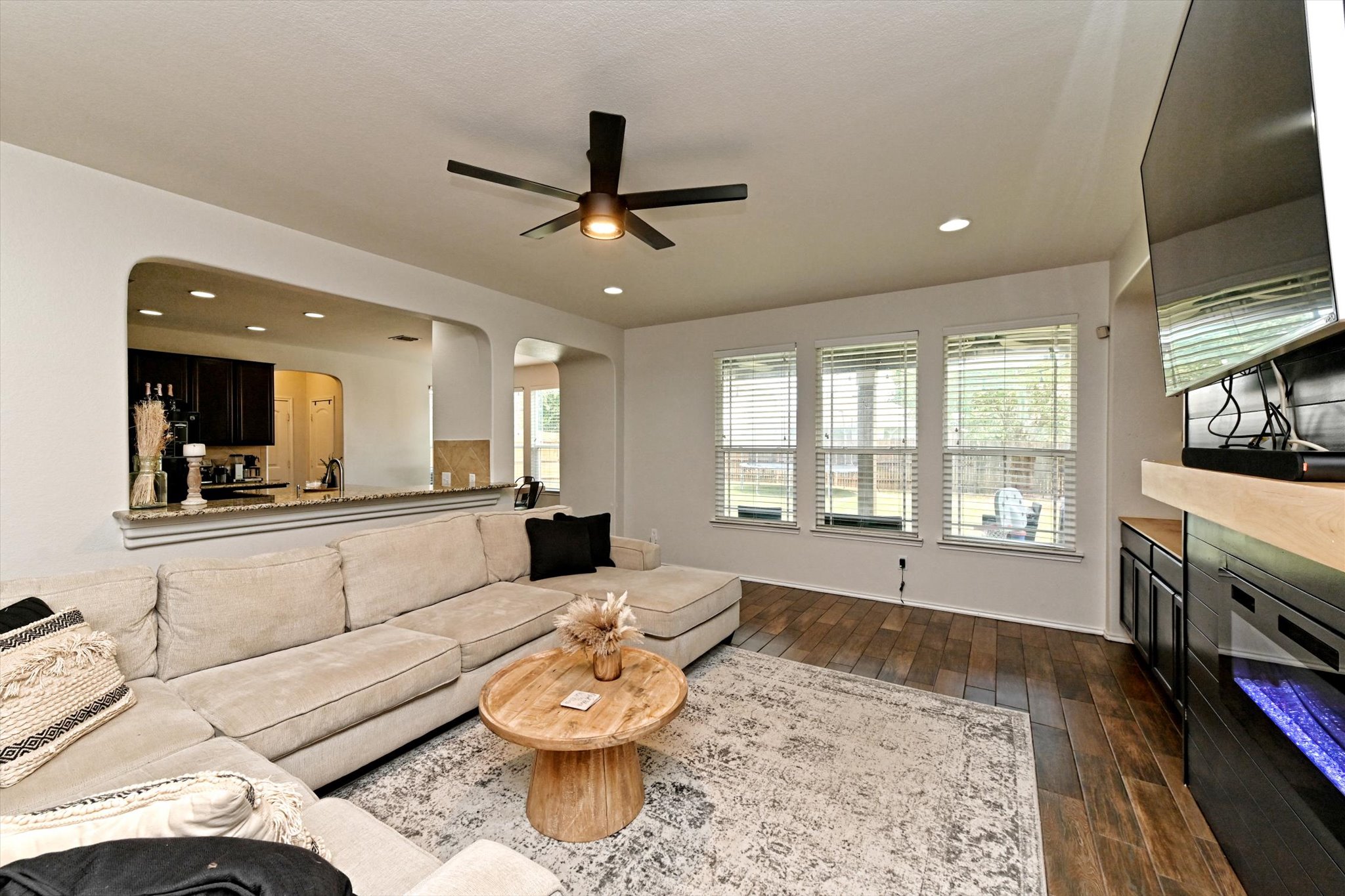 210 Animas Drive Georgetown, TX 78626 - Photo 8 of 31 a living room with furniture and a flat screen tv