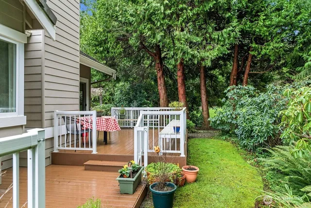 a view of a chair and tables front of the house