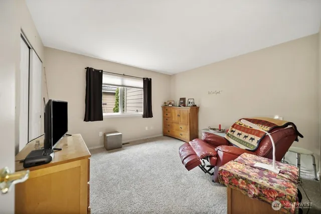 a kitchen with stainless steel appliances granite countertop a refrigerator and a stove