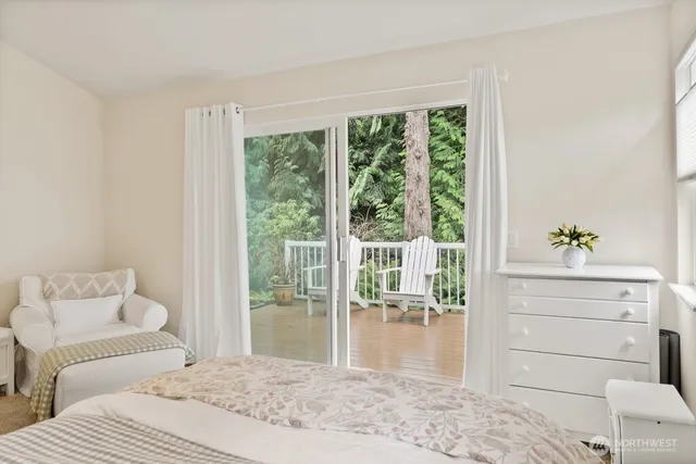 a view of house with swimming pool and a yard