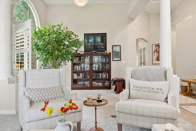 a living room with furniture and decor