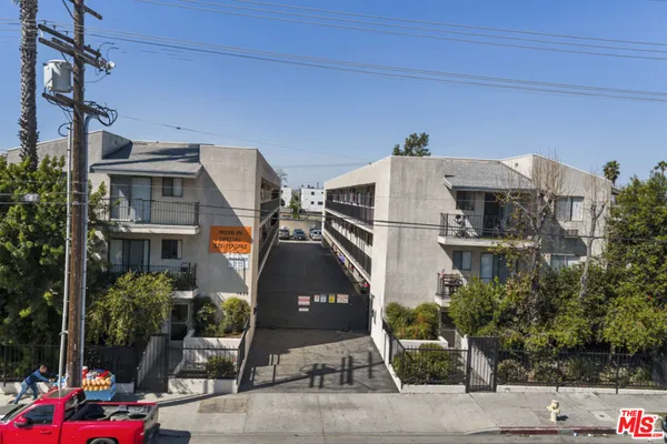 a front view of a building with street view