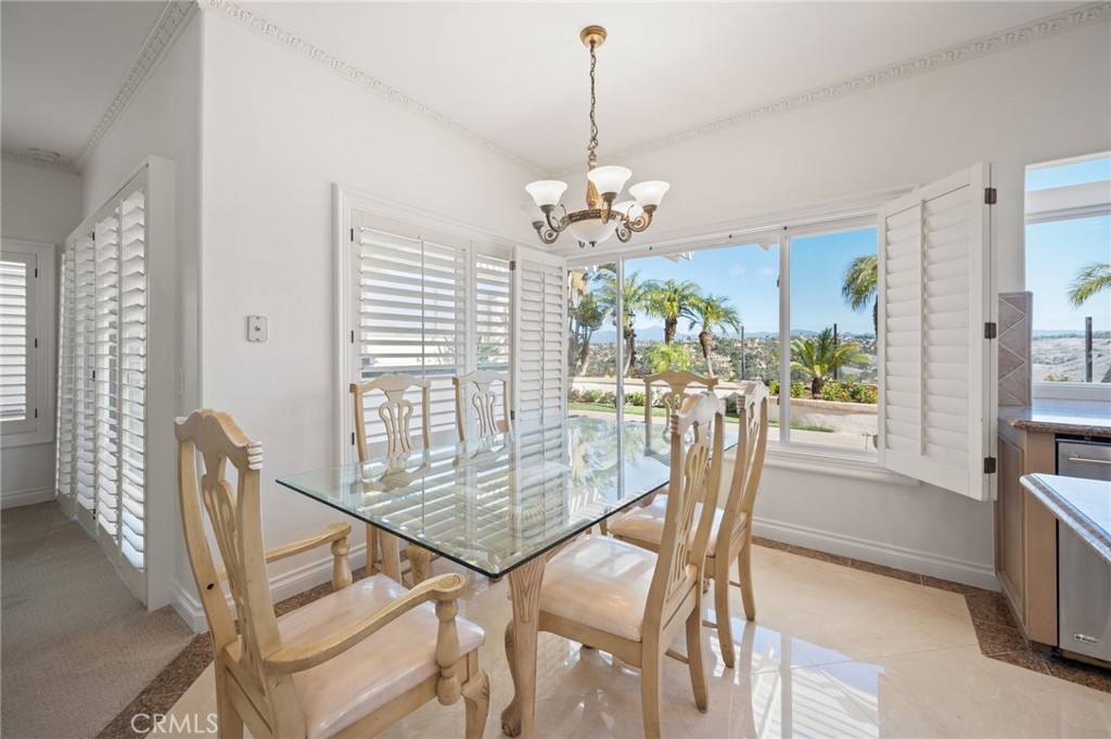 16 Charmony Laguna Niguel, CA 92677 - Photo 28 of 37 a view of a dining room with furniture window and outside view