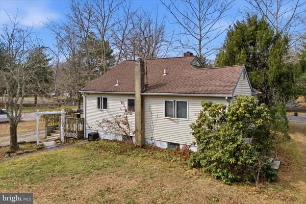 a aerial view of a house with garden