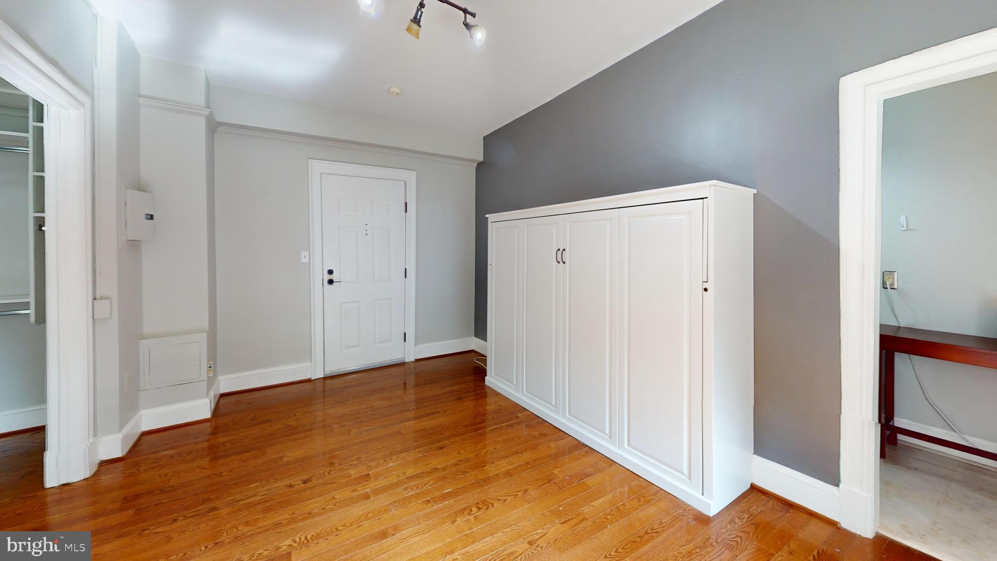 3446 Connecticut Avenue Northwest, Unit 203 Washington, DC 20008 - Photo 5 of 11 a view of hallway with wooden floor