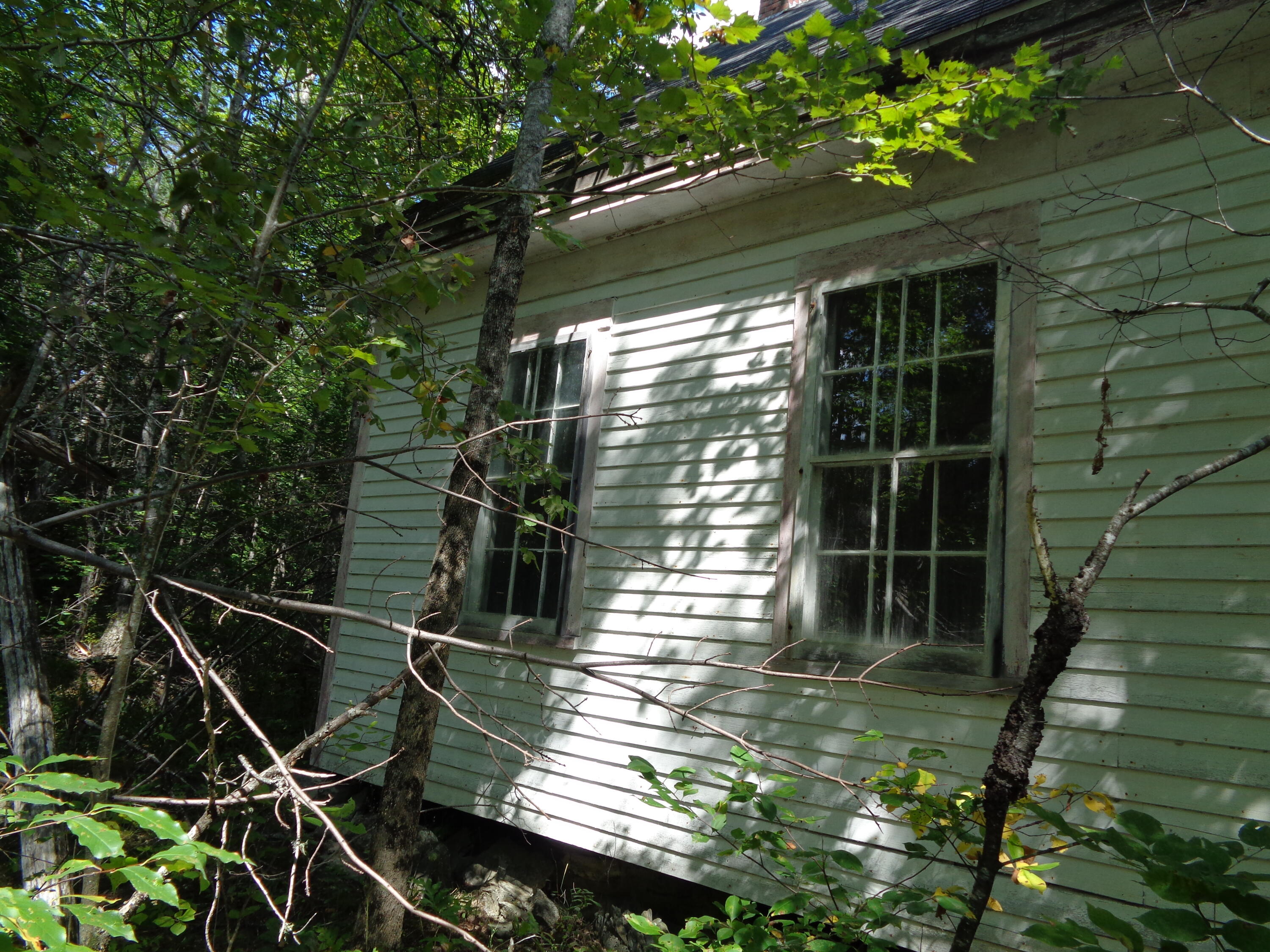 2068 Mariaville Road Ellsworth, ME 04605 - Photo 10 of 27 Side view with storm windows