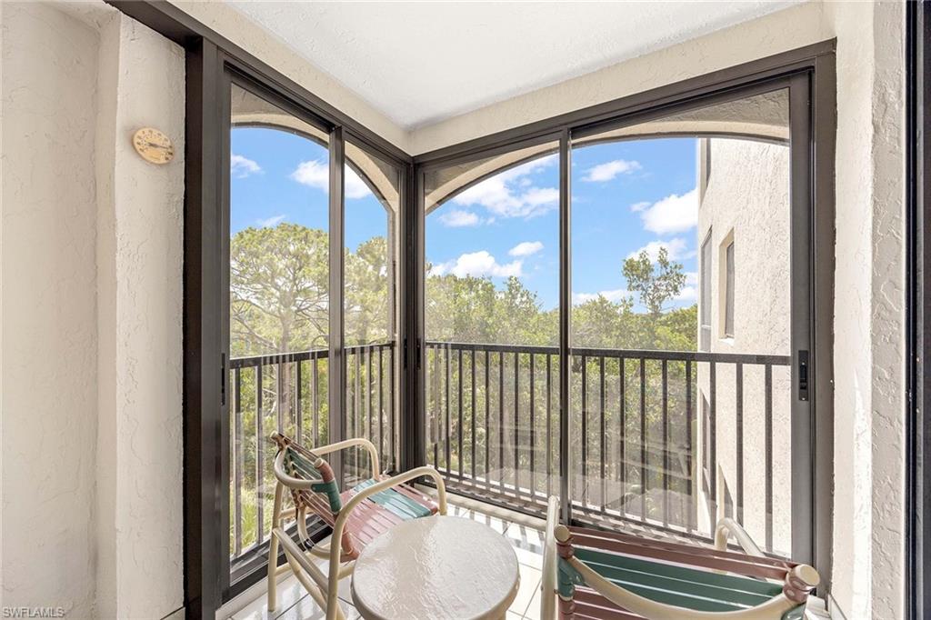 6500 Valen Way, Unit A402 Naples, FL 34108 - Photo 28 of 49 a view of a city from a balcony
