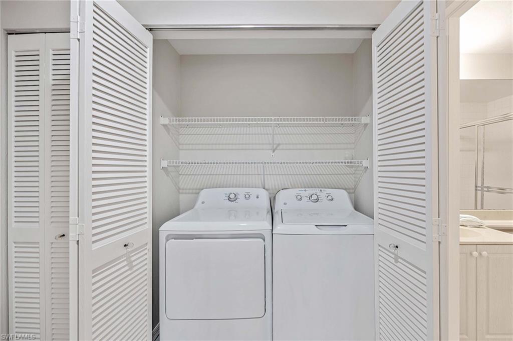 6500 Valen Way, Unit A402 Naples, FL 34108 - Photo 31 of 49 a utility room with dryer and washer