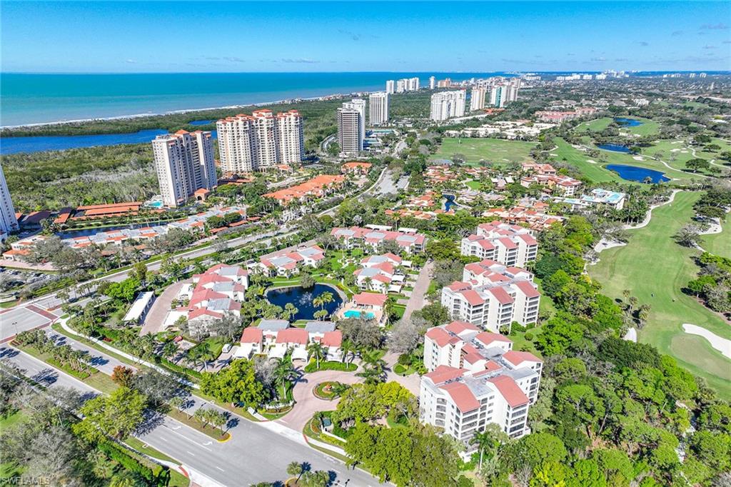 6500 Valen Way, Unit A402 Naples, FL 34108 - Photo 4 of 49 a city view with tall buildings