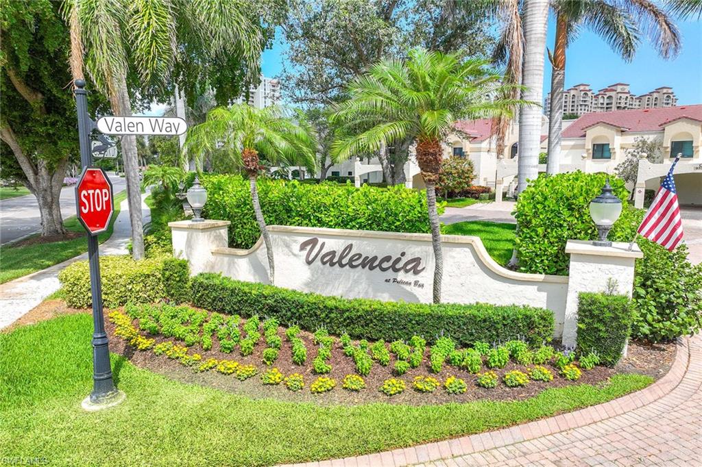 6500 Valen Way, Unit A402 Naples, FL 34108 - Photo 49 of 49 a view of sign board with flower around