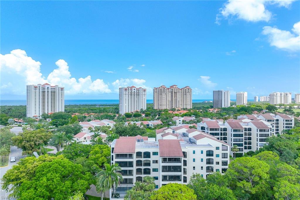 6500 Valen Way, Unit A402 Naples, FL 34108 - Photo 7 of 49 a view of a city with tall buildings