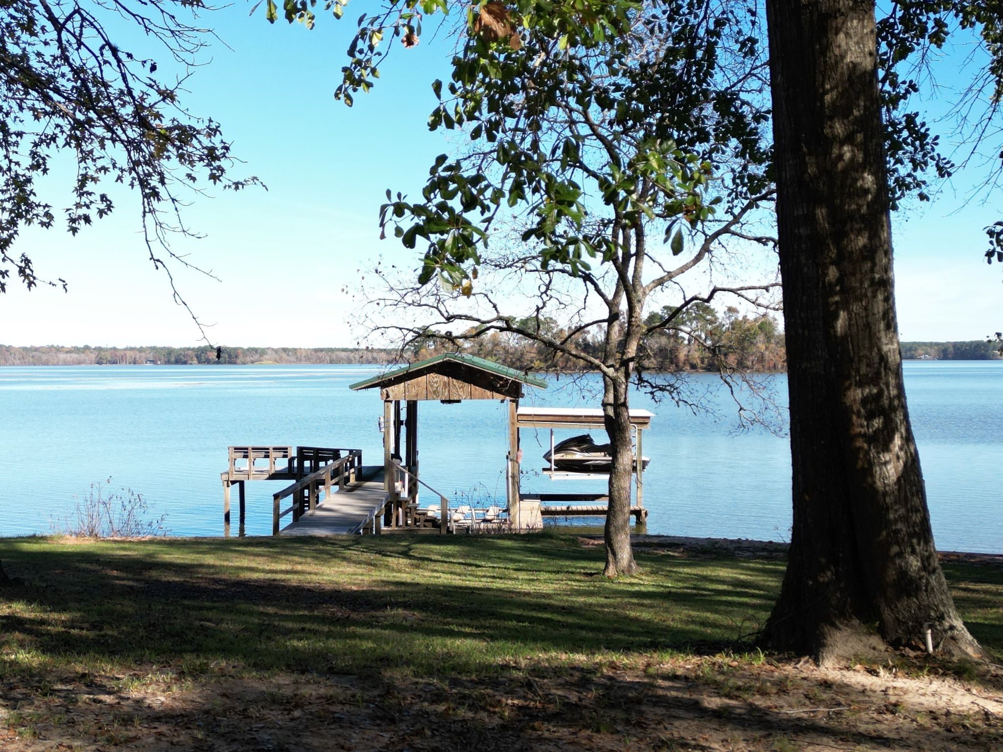 a view of a lake with a park
