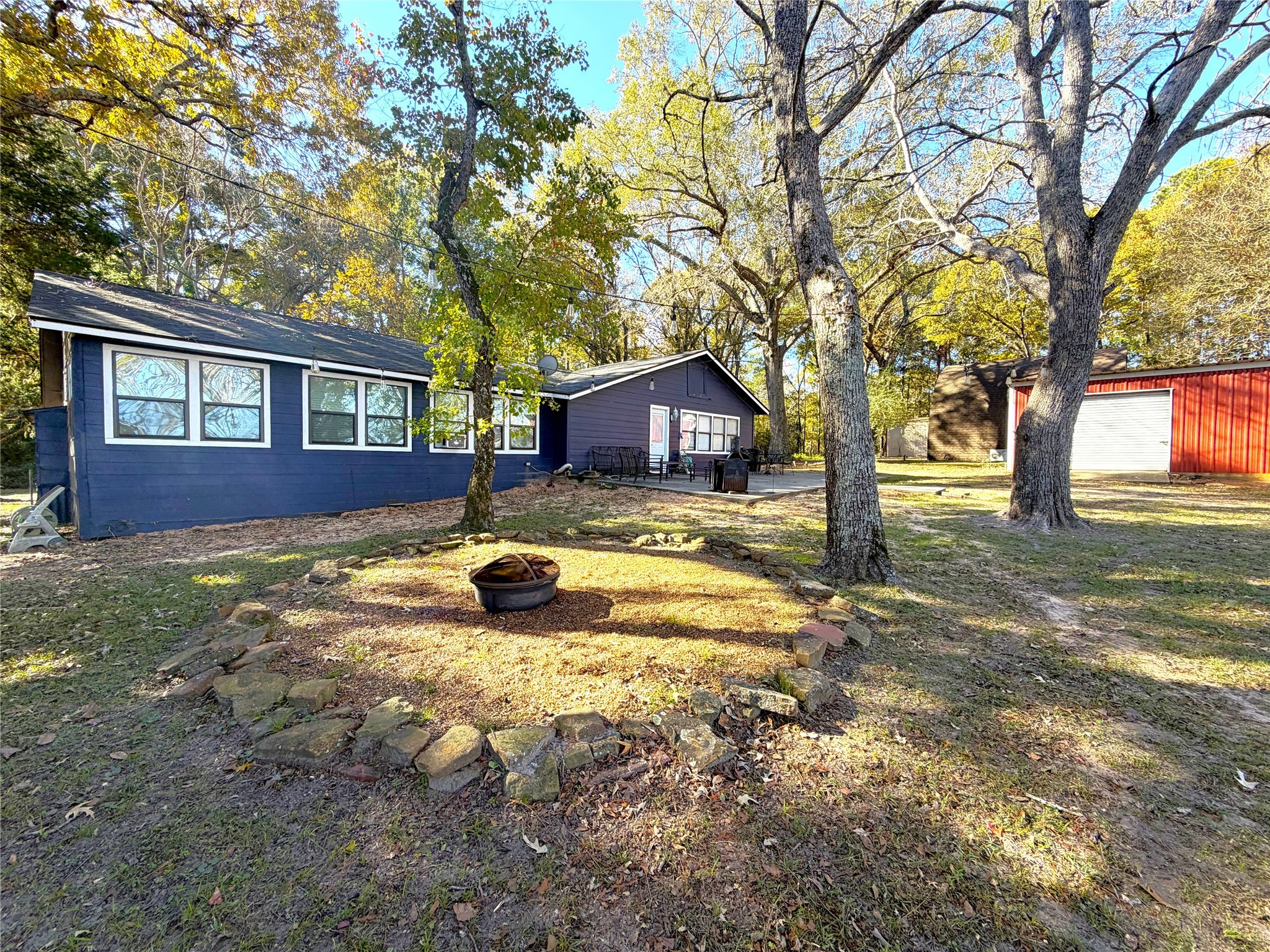 161 East Waltz Lane Trinity, TX 75862 - Photo 11 of 39 a view of house with yard and tree in front of it