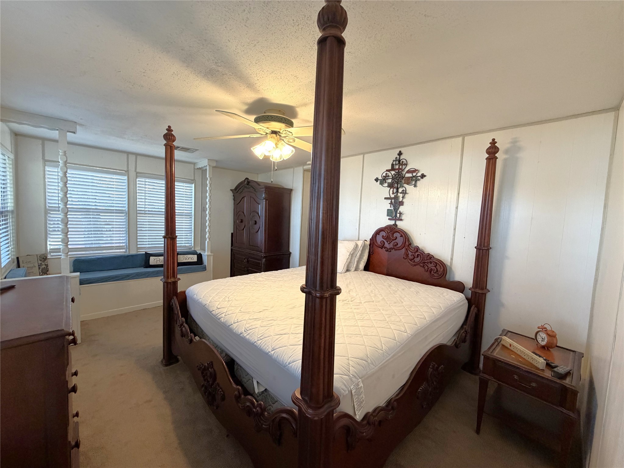 161 East Waltz Lane Trinity, TX 75862 - Photo 29 of 39 a bed room with a bed and a chandelier