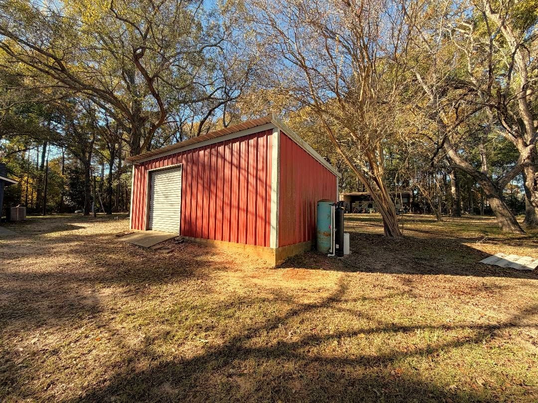 161 East Waltz Lane Trinity, TX 75862 - Photo 37 of 39 a view of backyard with large trees