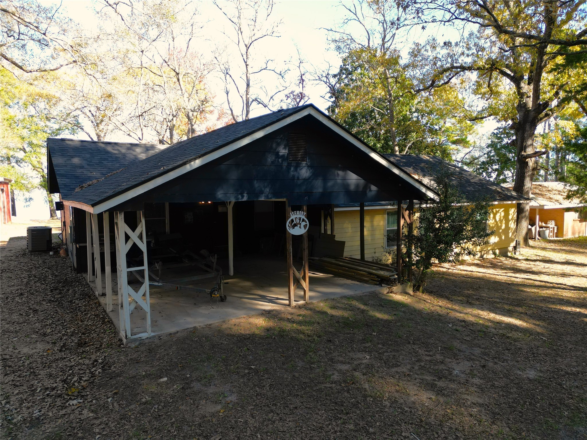 161 East Waltz Lane Trinity, TX 75862 - Photo 6 of 39 a backyard of a house with barbeque oven table and chairs