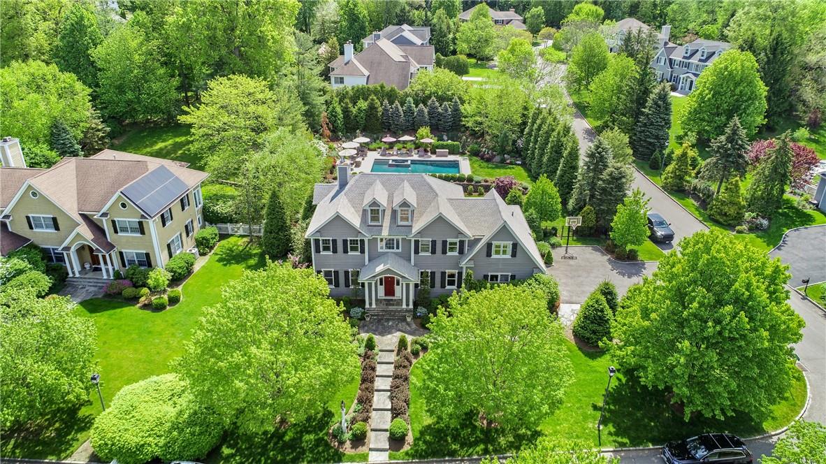 8 Johnson Place Rye, NY 10580 - Photo 1 of 1 an aerial view of a house with a big yard and large trees