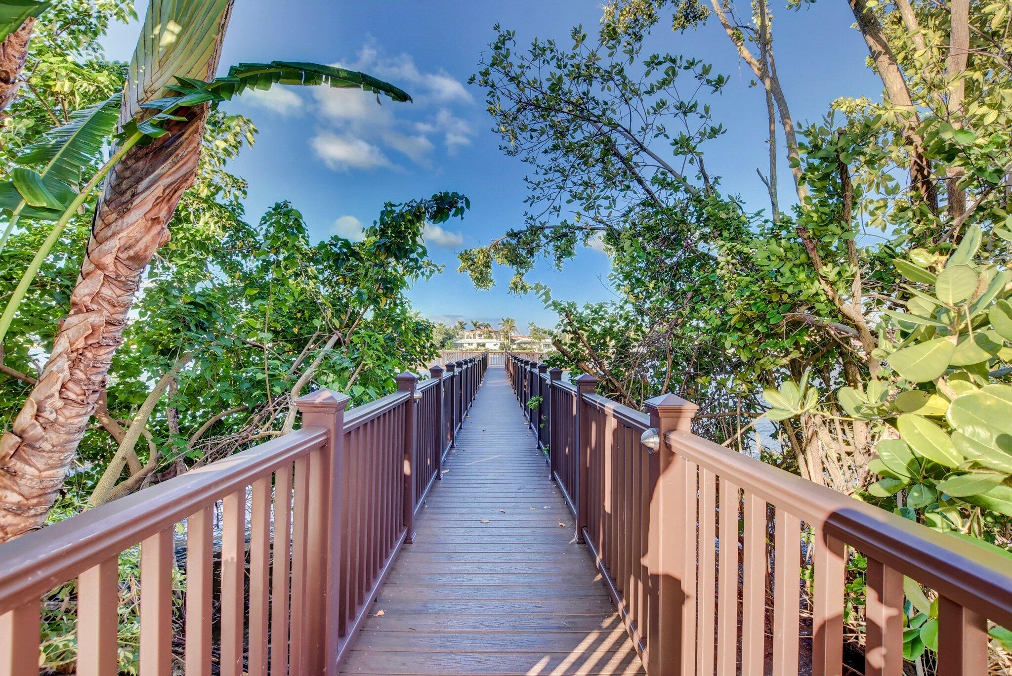 3606 South Ocean Boulevard, Unit 406 Highland Beach, FL 33487 - Photo 14 of 30 a view of a balcony with wooden stairs