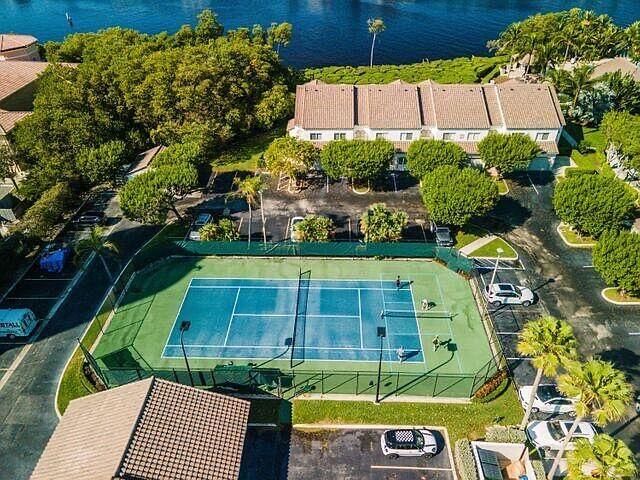 3606 South Ocean Boulevard, Unit 406 Highland Beach, FL 33487 - Photo 18 of 30 an aerial view of a house with a yard