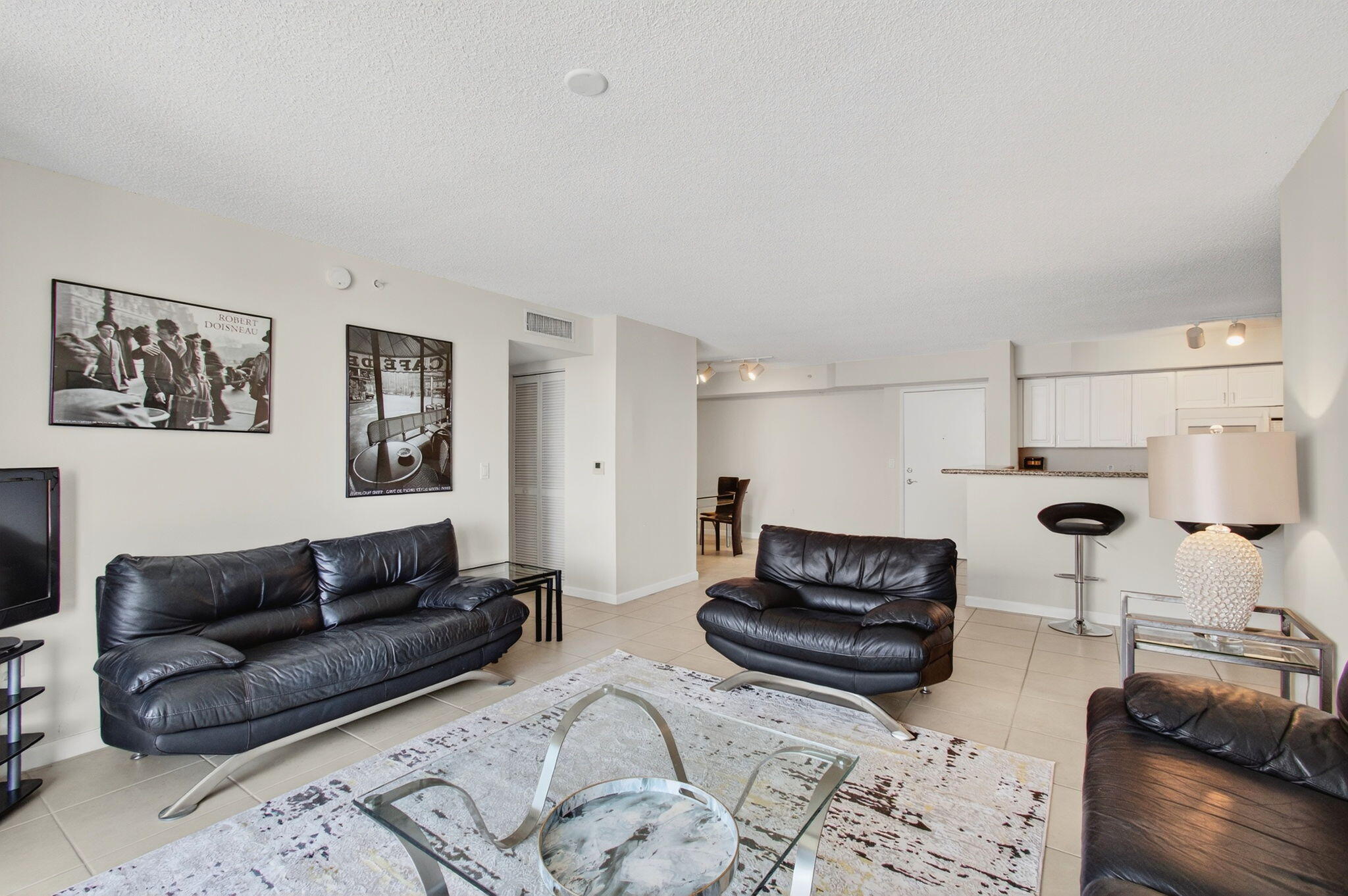 3606 South Ocean Boulevard, Unit 406 Highland Beach, FL 33487 - Photo 21 of 30 a living room with furniture a rug and a couch