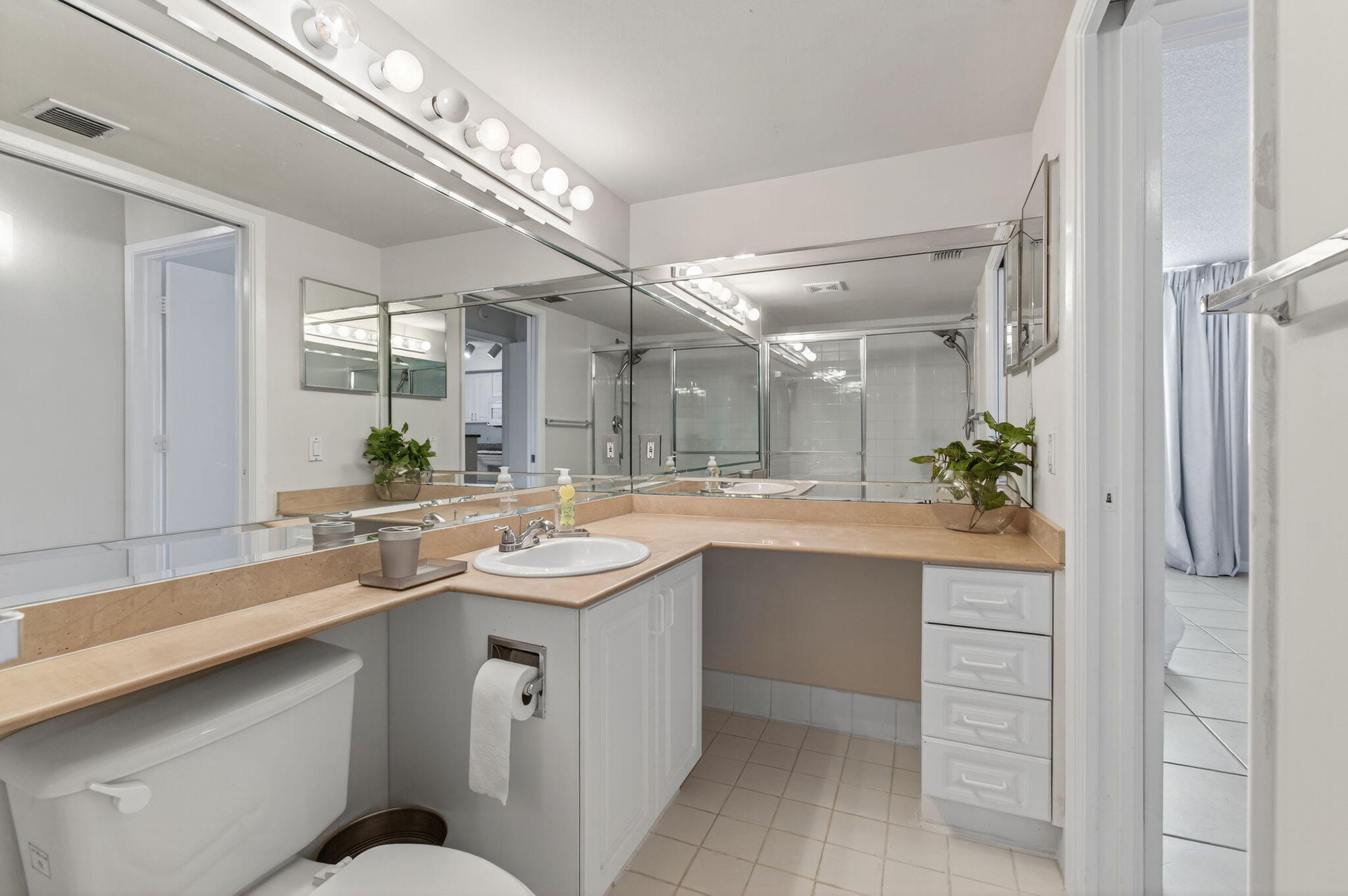 3606 South Ocean Boulevard, Unit 406 Highland Beach, FL 33487 - Photo 28 of 30 a kitchen with a sink and cabinets