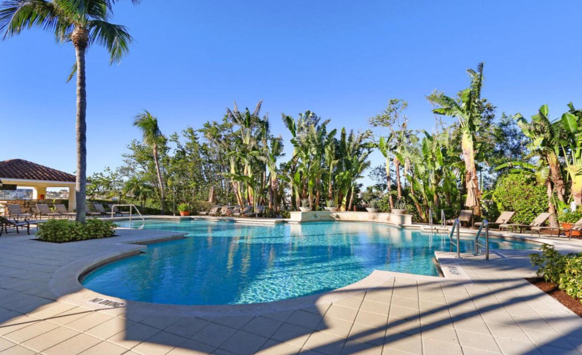 3606 South Ocean Boulevard, Unit 406 Highland Beach, FL 33487 - Photo 8 of 30 a view of a swimming pool with a patio
