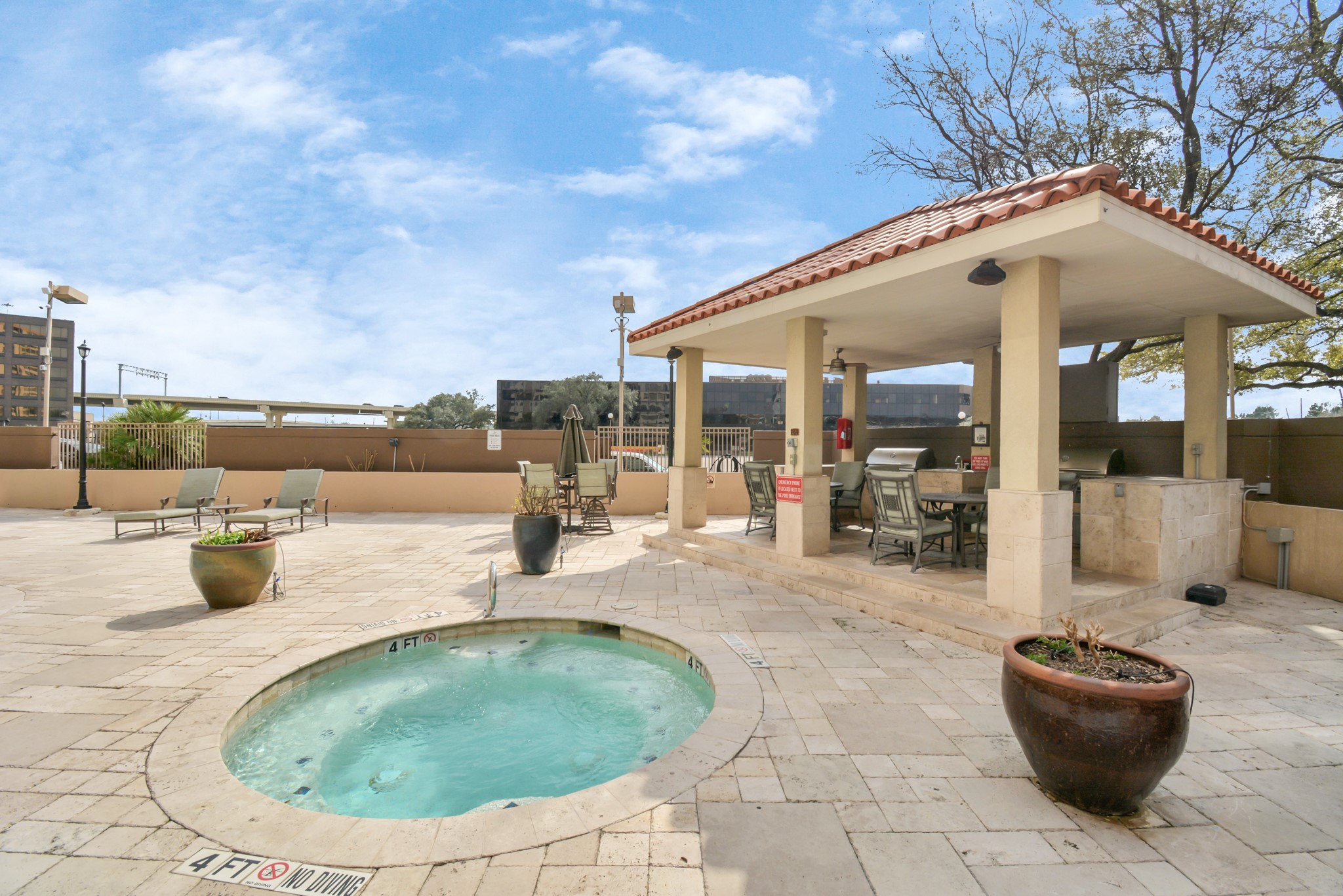 3525 Sage Road, Unit 1314 Houston, TX 77056 - Photo 38 of 40 a view of a patio with swimming pool