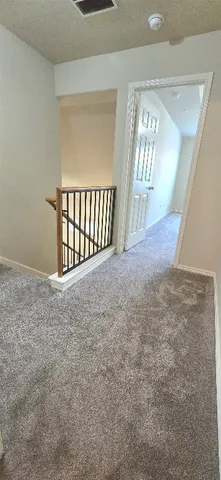 a view of a big room with windows