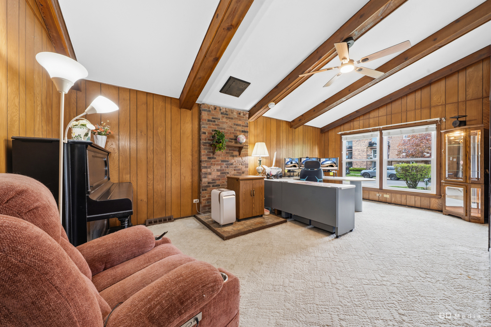 9826 Nottingham Avenue Chicago Ridge, IL 60415 - Photo 14 of 35 a living room with furniture a kitchen view and a chandelier