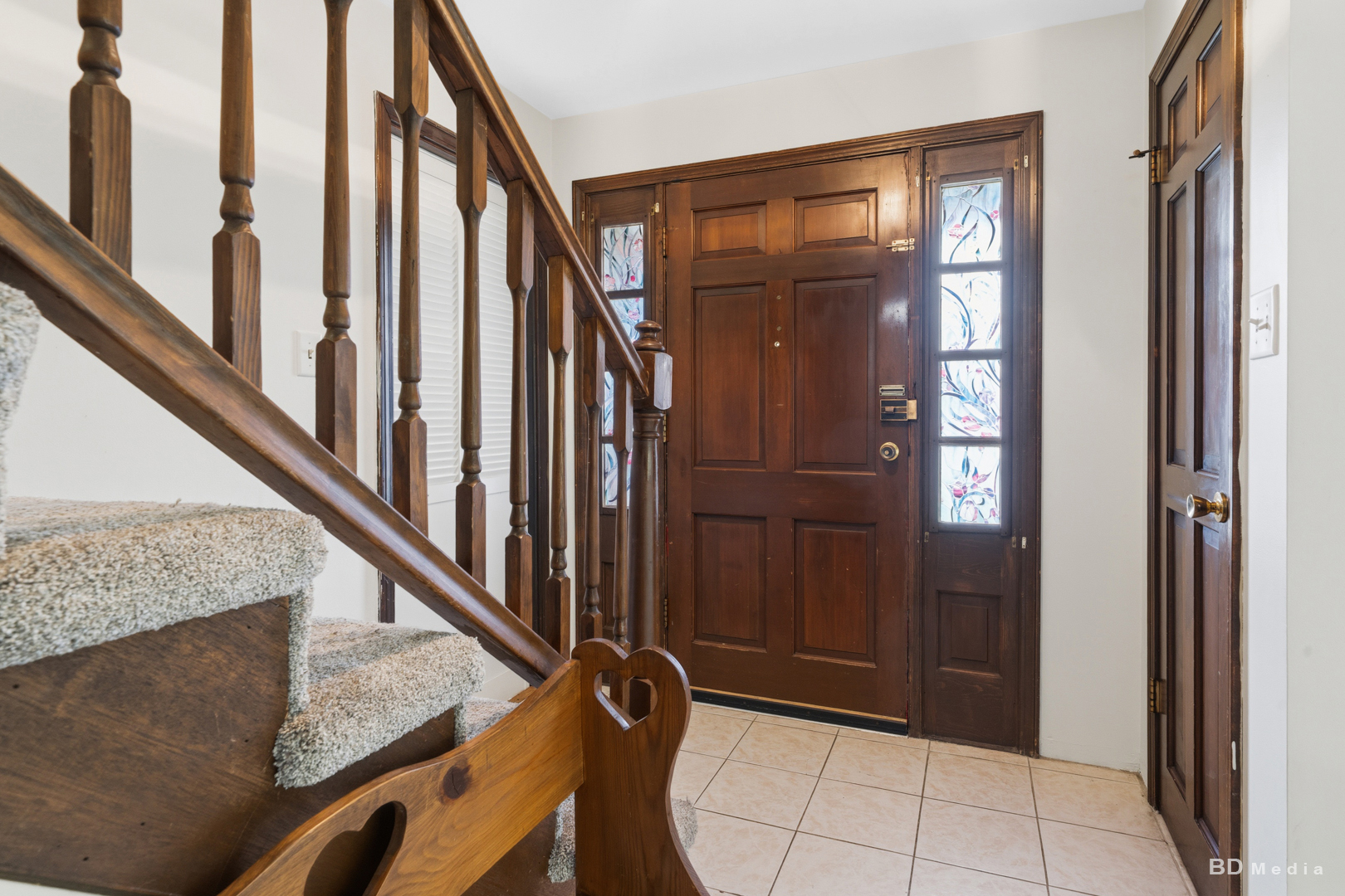 9826 Nottingham Avenue Chicago Ridge, IL 60415 - Photo 4 of 35 a view of an entryway with staircase