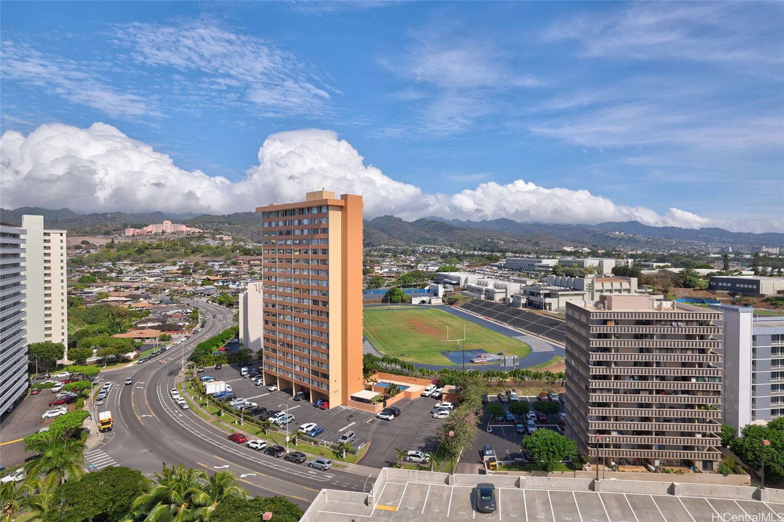 3009 Ala Makahala Place, Unit 1804 Honolulu, HI 96818 - Photo 13 of 20 a city view with tall buildings