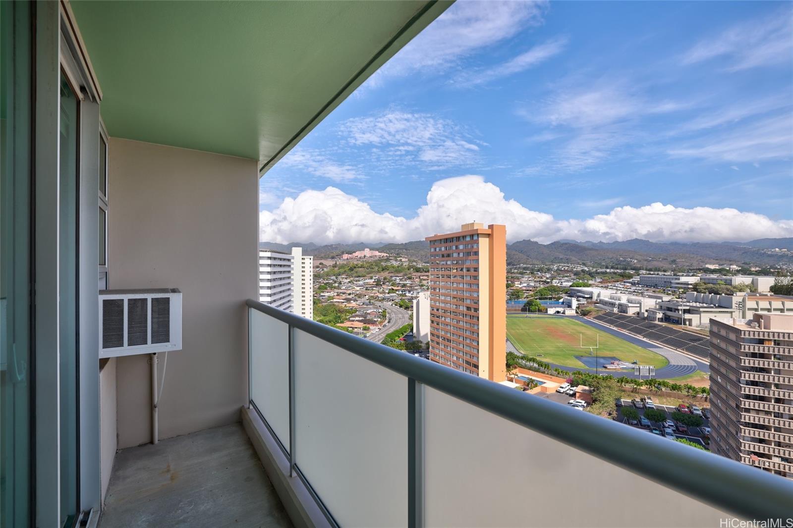 3009 Ala Makahala Place, Unit 1804 Honolulu, HI 96818 - Photo 14 of 20 a view of a city from a balcony