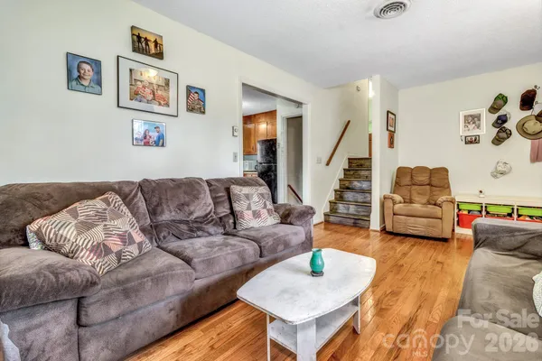 a living room with furniture and a couch