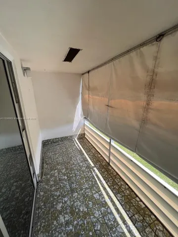 a bathroom with a sink and a shower