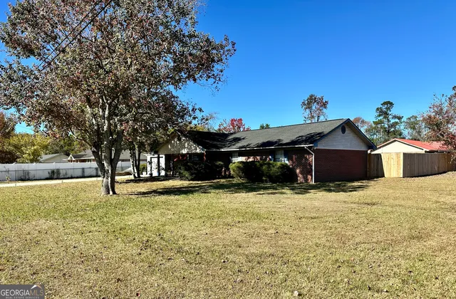 a front view of a house with a patio