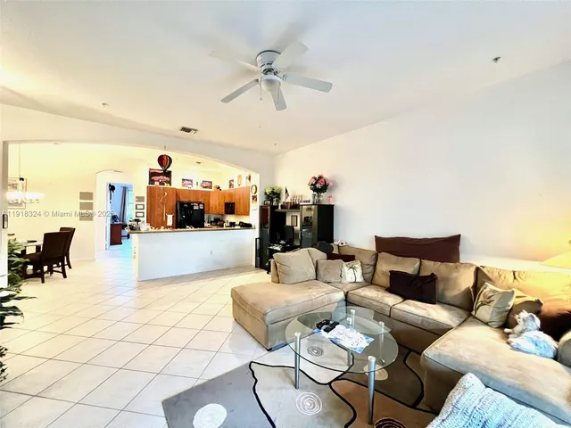a living room with furniture and a view of living room