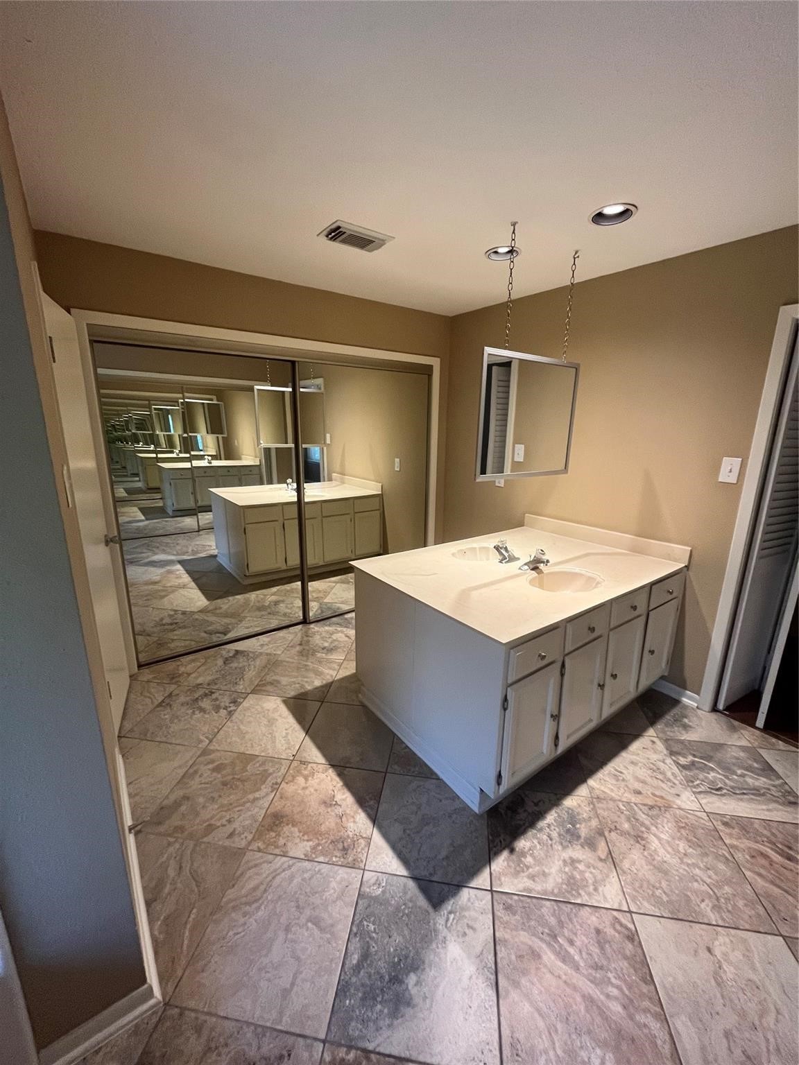 25531 Chapel Ridge Lane Spring, TX 77373 - Photo 9 of 14 a bathroom with a sink a mirror and shower