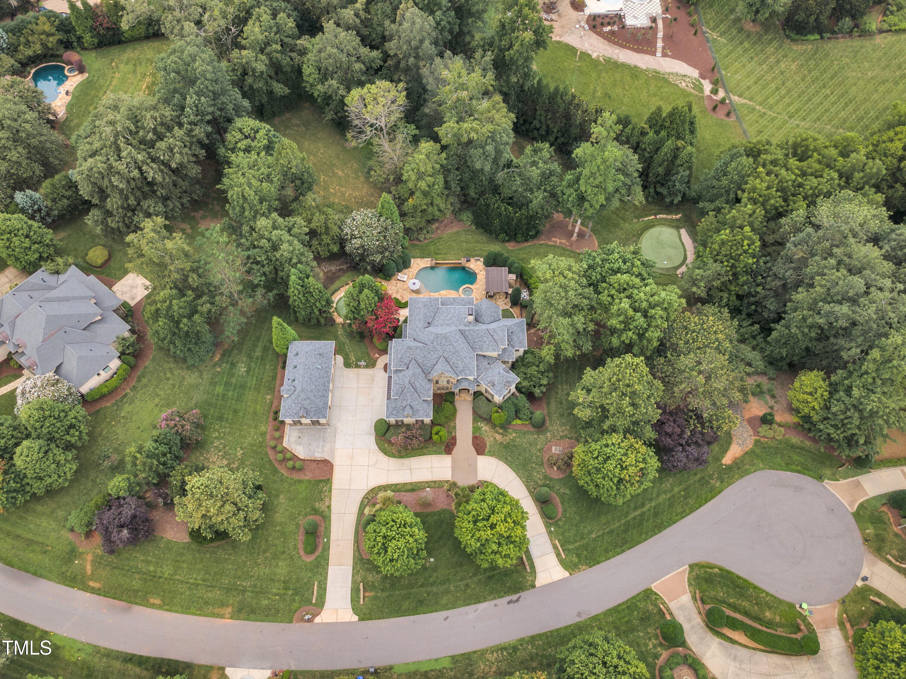 1112 Stone Kirk Drive Raleigh, NC 27614 - Photo 25 of 100 an aerial view of a house with a yard basket ball court and outdoor seating