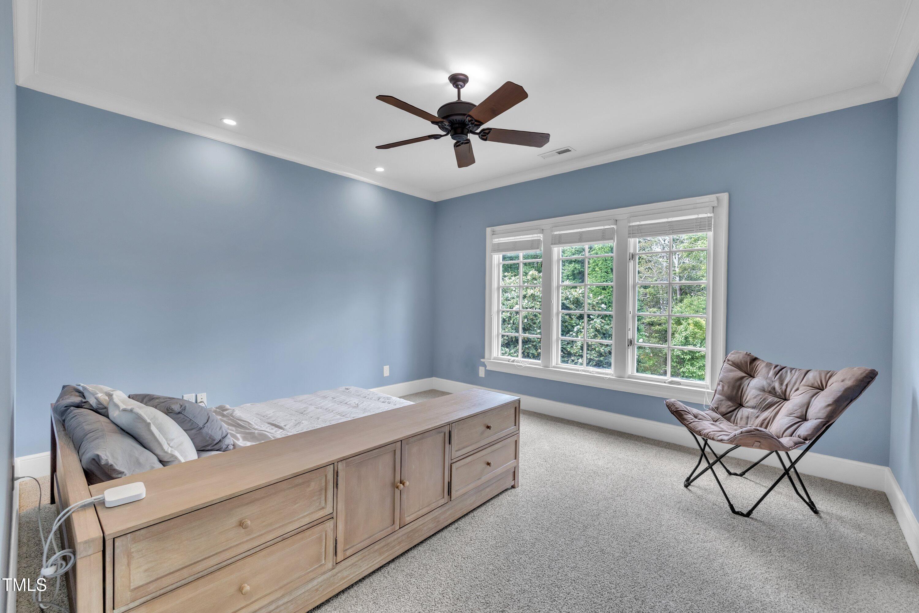 1112 Stone Kirk Drive Raleigh, NC 27614 - Photo 58 of 100 a living room with furniture and a window