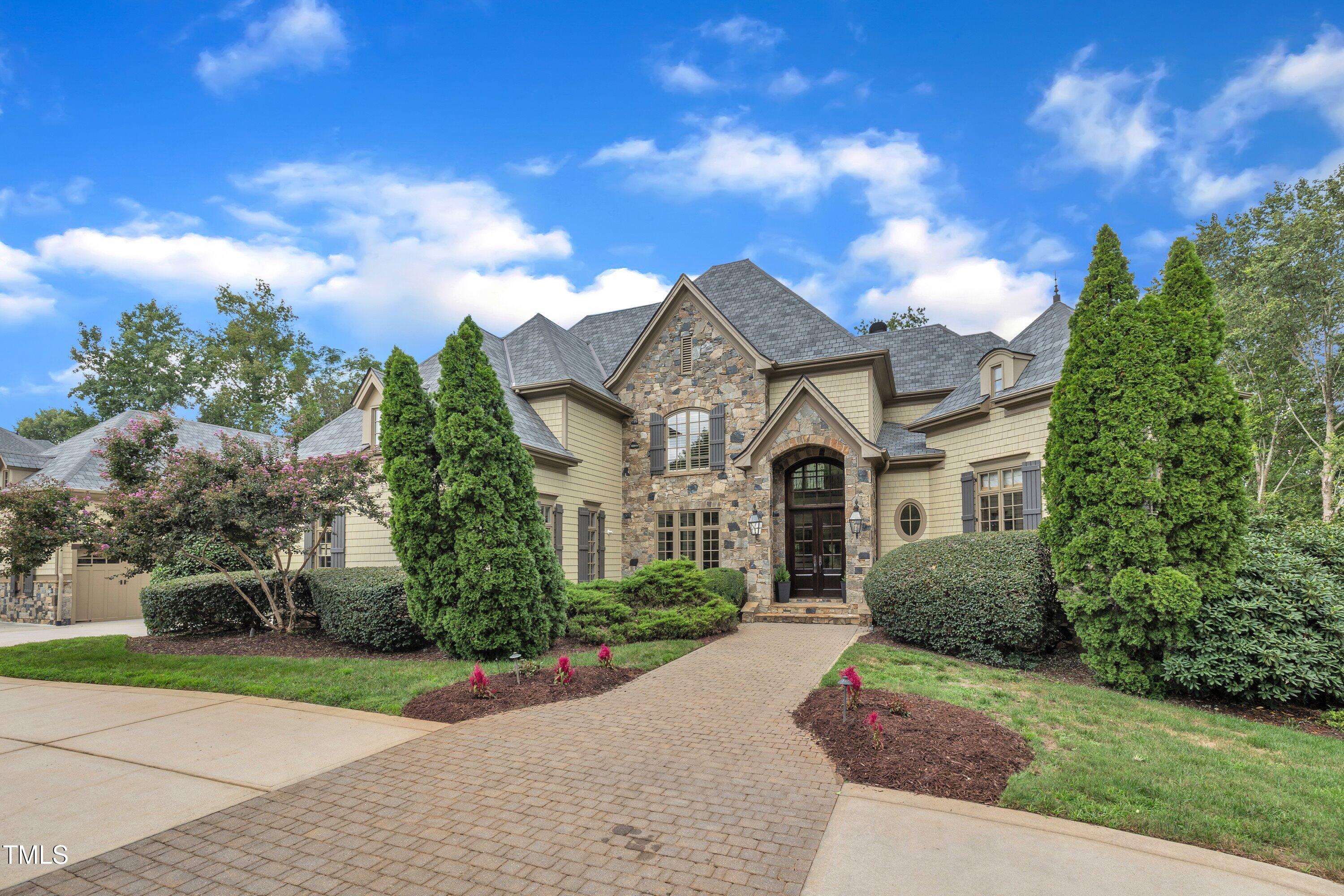 1112 Stone Kirk Drive Raleigh, NC 27614 - Photo 6 of 100 a front view of a house with a yard