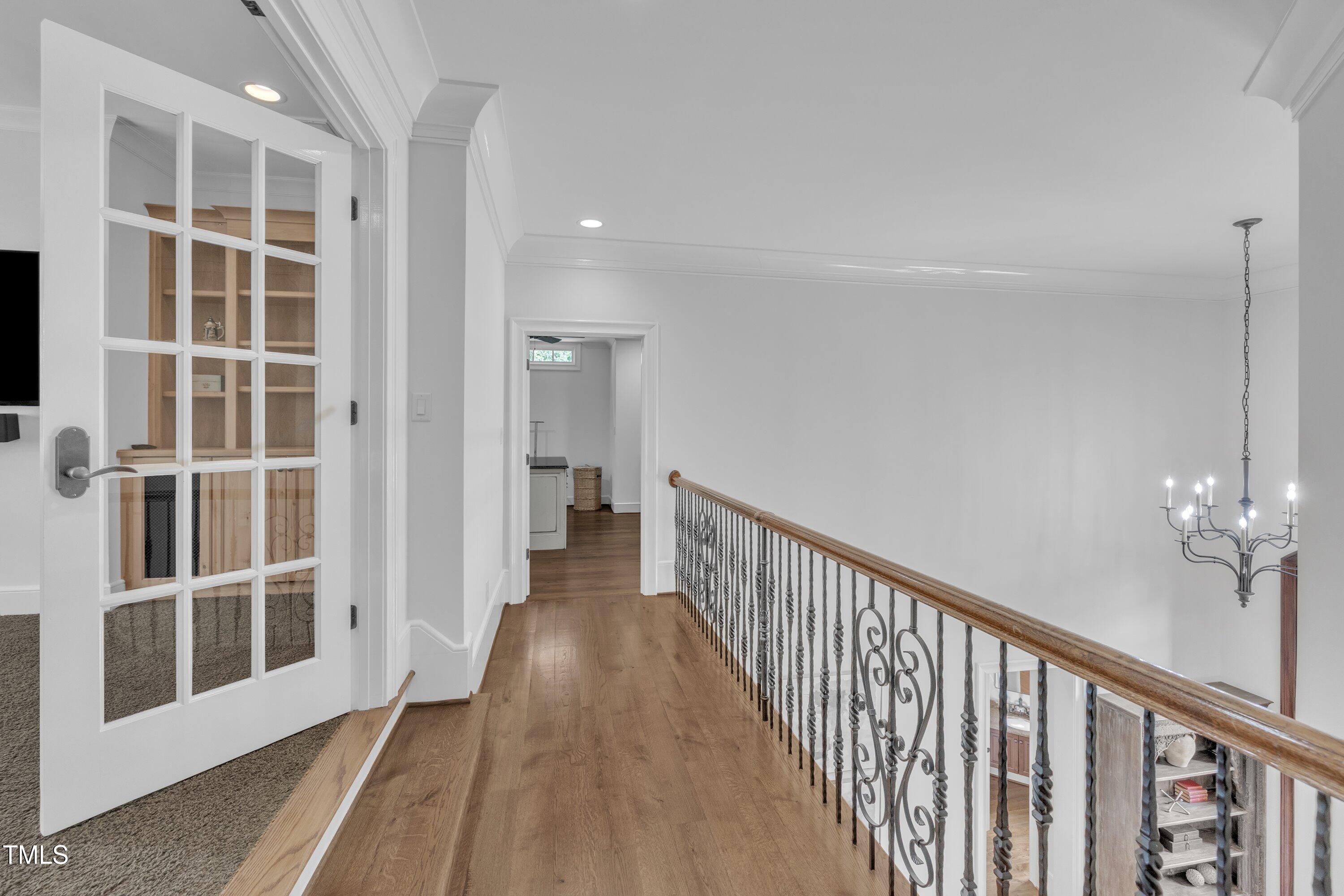 1112 Stone Kirk Drive Raleigh, NC 27614 - Photo 65 of 100 a view of a balcony with wooden floor and windows