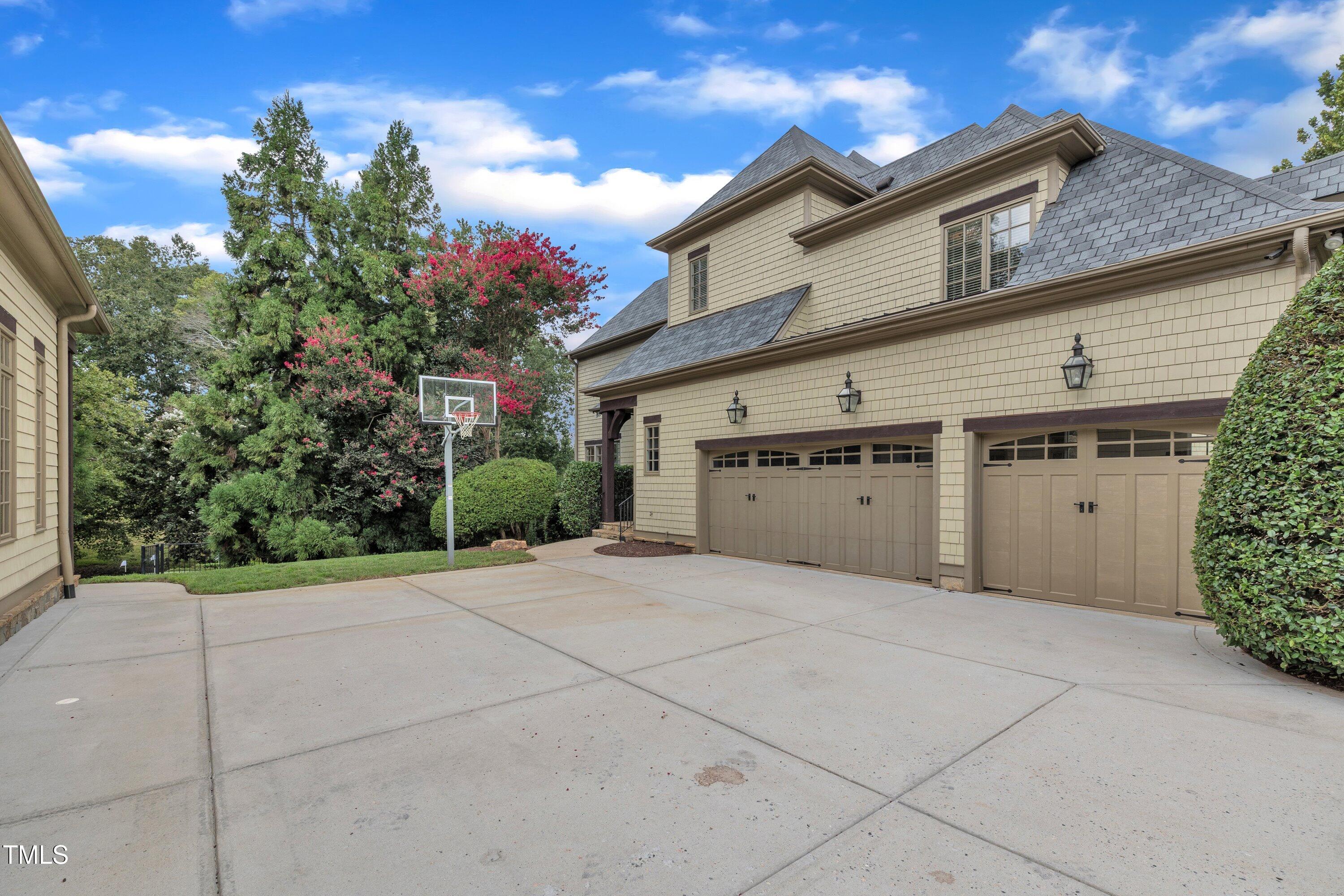 1112 Stone Kirk Drive Raleigh, NC 27614 - Photo 7 of 100 a view of a house with a garage