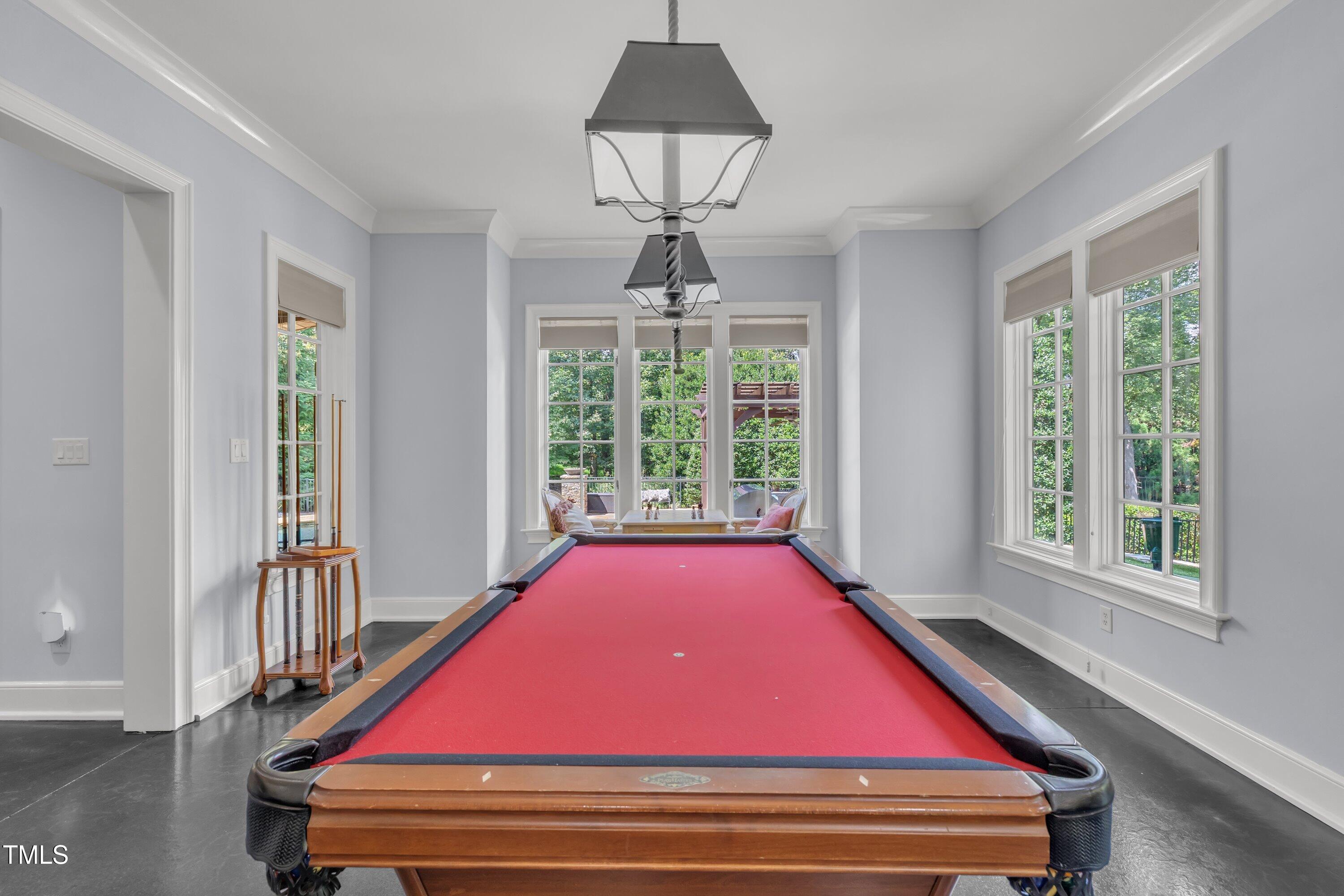 1112 Stone Kirk Drive Raleigh, NC 27614 - Photo 81 of 100 a room with pool table and windows