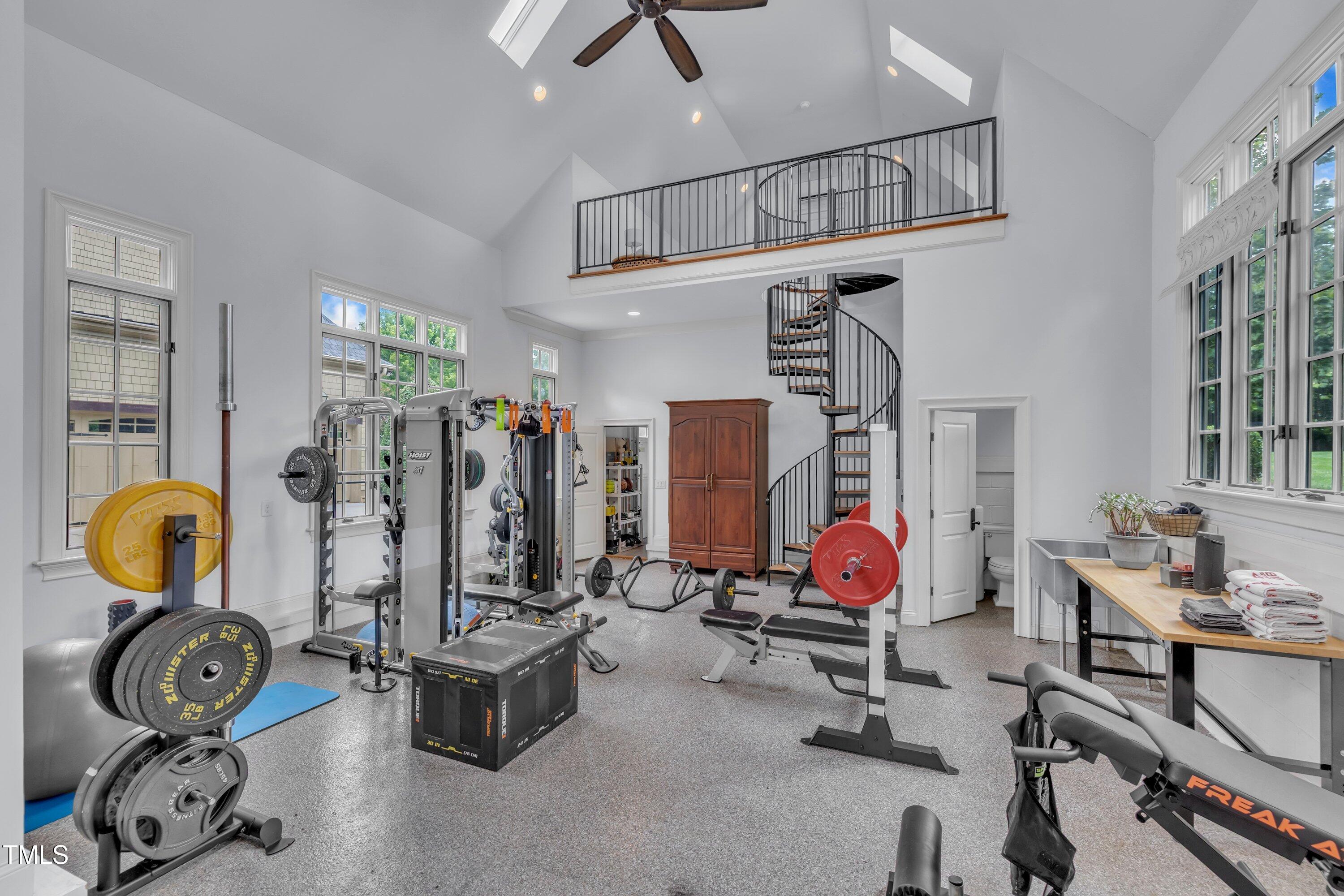 1112 Stone Kirk Drive Raleigh, NC 27614 - Photo 96 of 100 a view of a room with gym equipment