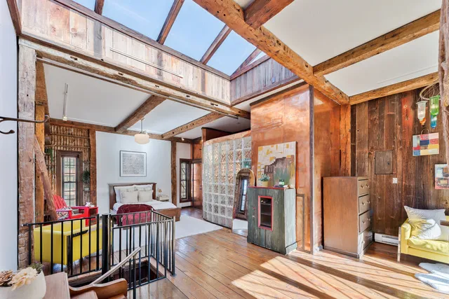 a view of a chairs and table in a patio
