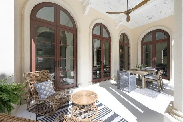 an aerial view of residential houses with outdoor space and river